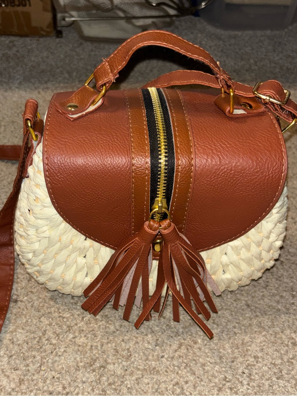 Woven straw and faux leather crossbody bag
